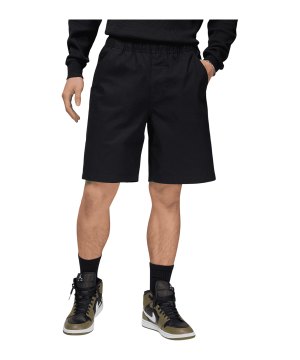jordan-essentials-woven-short-schwarz-f010-hf9335-lifestyle_front.png